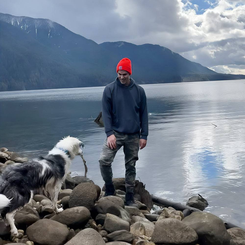 Mike, founder of LookiBooki, with his dog Mayzie.